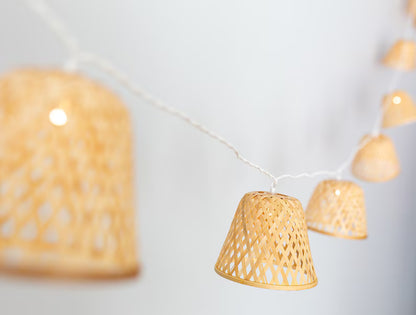 Outdoor LED string lights with 16 bamboo shades, 4.5m long. Plug and transformer are included.